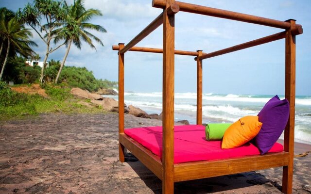 UTMT Underneath the Mango Tree Beach & Spa