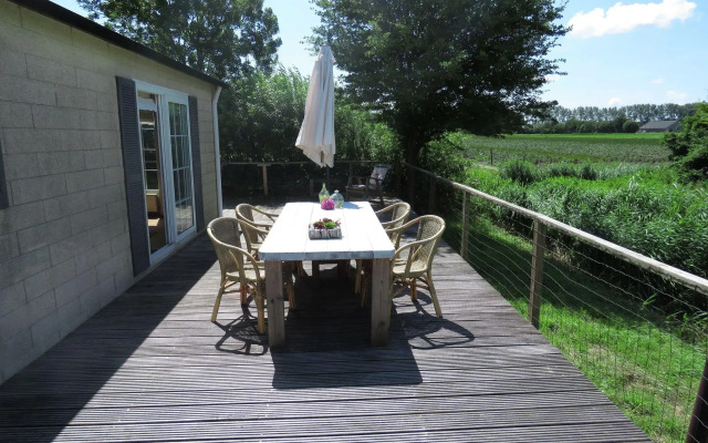 Detached chalet with nice terrace, near recreational lake