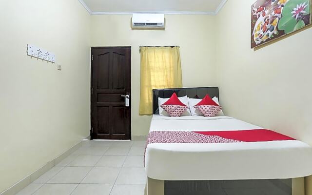 OYO 90907 Handika Jaya Bs
