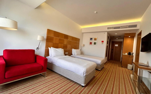 Golden Tulip Muscat