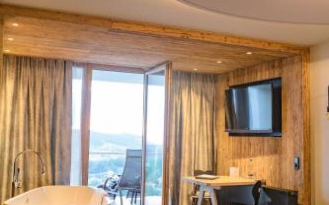 Hüttenhof - Wellnesshotel & Luxus-Bergchalets - Adults only