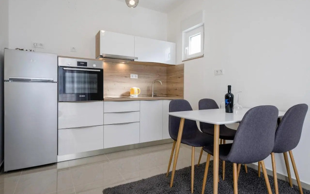 Apartments with a parking space Palit, Rab - 4971