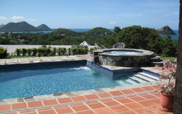 Spanish-style Ocean View Villa Set In Garden - Calypso Court 3 Bedroom Villa by RedAwning