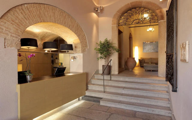 Отель NH Collection Cáceres Palacio de Oquendo