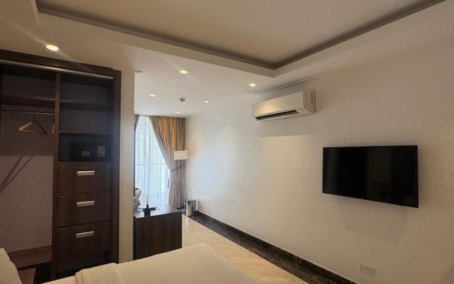 Boardroom Apartment  by Jotani Living
