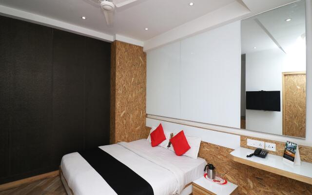 Capital O 7743 Hotel Hiland International