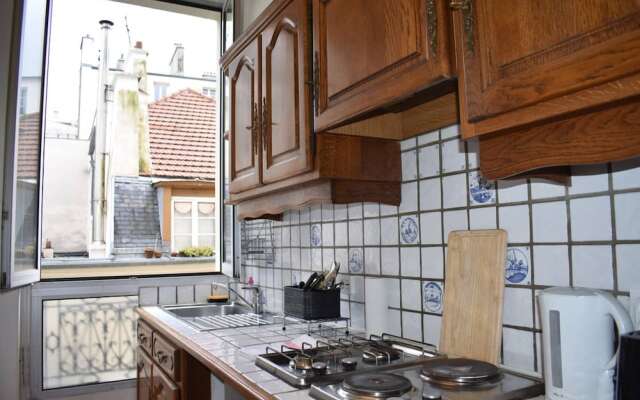 Parisian Apartment In Prime Location