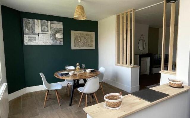 Coeur de ville, T2 cosy & élégant avec jardin