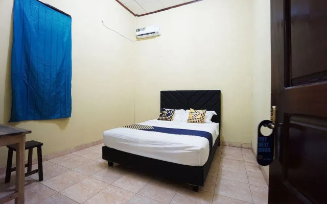 SPOT ON 2530 Tiga Mas Inn