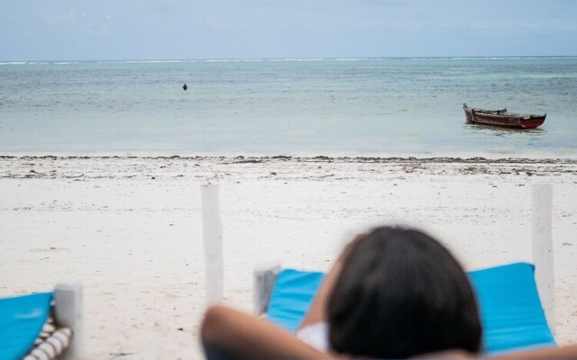 Neema Barefoot Beach House