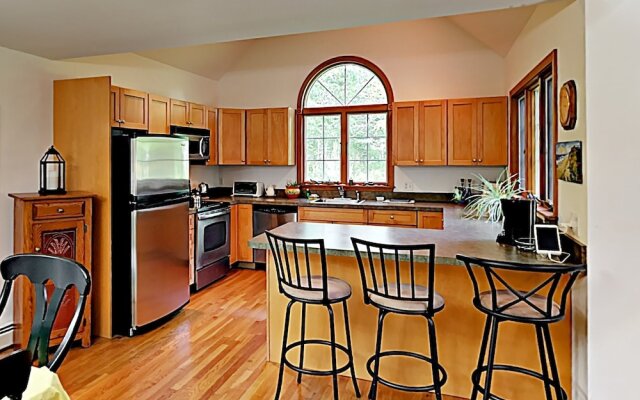 Woodsy Cape Cod Home by RedAwning