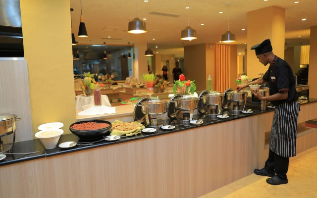 Kenenisa.. Oasis International Hotel