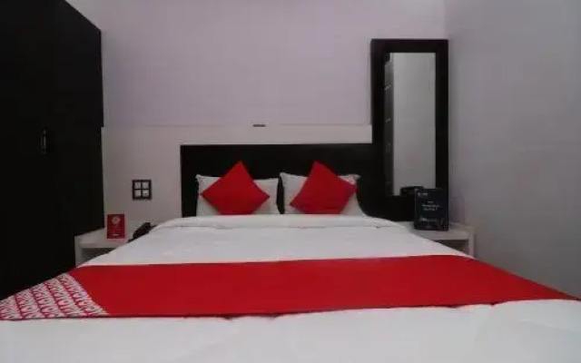 Cocktail Hotel by OYO Rooms