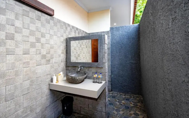 Pemuntalan Guesthouse by WizZeLa