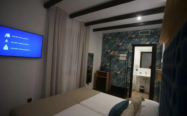 Hostal Santa Habitaciones