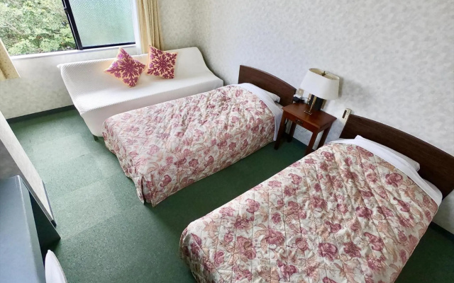 Pension Moon Villa – Guest Rooms – Onna