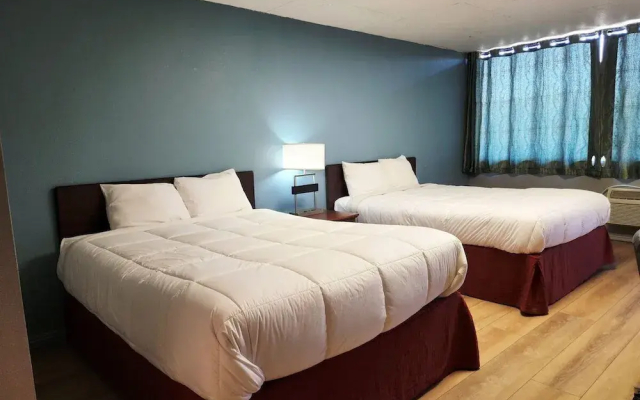 Executive Inn By OYO Queenville Mena