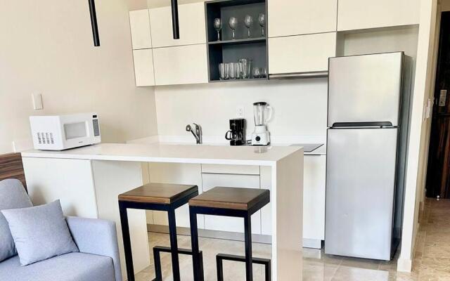 Fresh and Stylish Studio Aldea Zama rooftop pool Mya 109