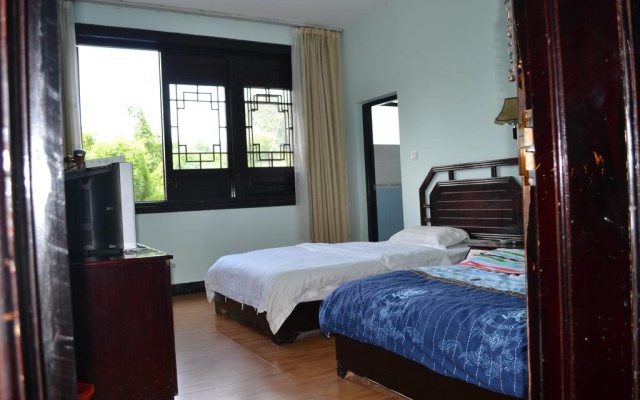 Yangshuo Qiqi Guesthouse – Guest Rooms – Guilin