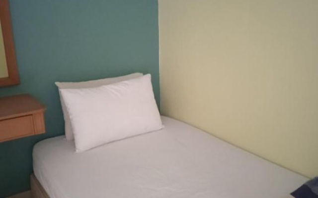 Santai Inn aprt 3 bilik Moslim Blok D w WiFi & Astro at Glory Beach Resort – Guest Rooms – Port Dickson