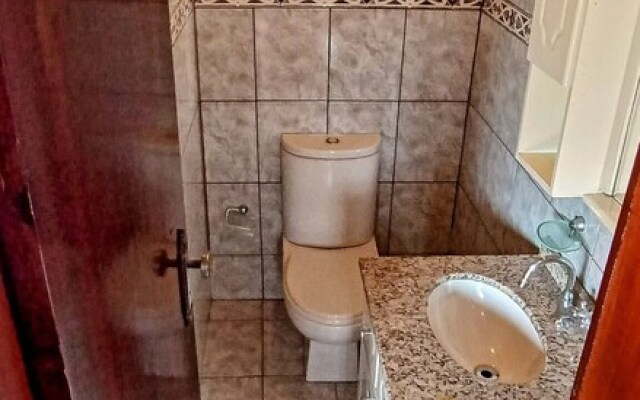 Casa com Piscina e Churrasqueira