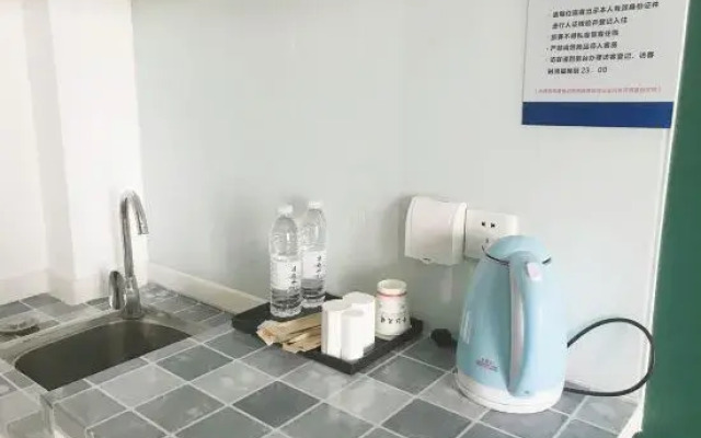 Home Huayi Hotel (Pingdu Renmin Road Branch