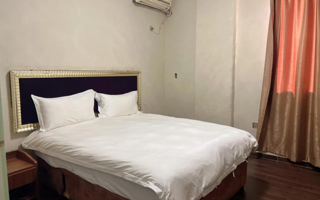 Shengtang Business Hotel