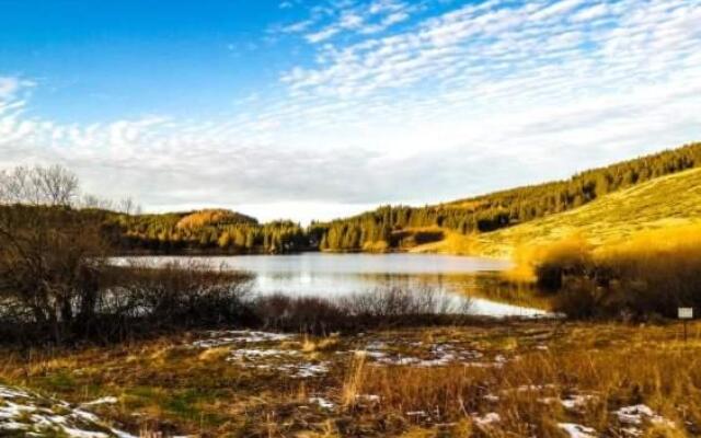 Séjour avec piscine chauffée