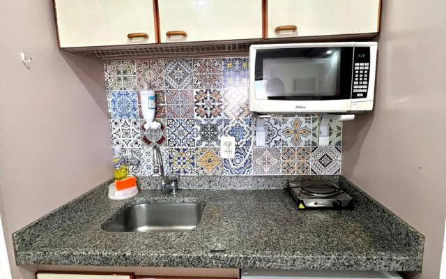 Estúdio QI Ibirapuera cozinha compacta e limpeza diária UH2011