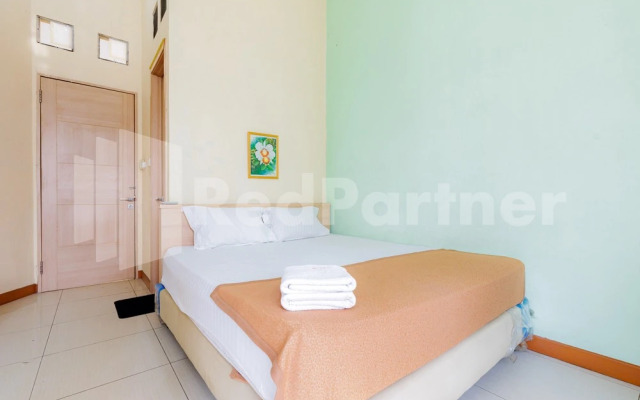 Wisma Anggrek Syariah Mitra Reddoorz