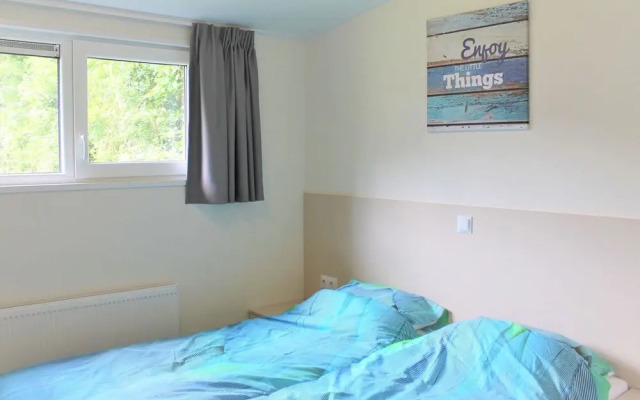 Modern chalet with a dishwasher, near a pond