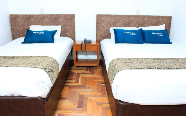 Hotel Pumas Inn