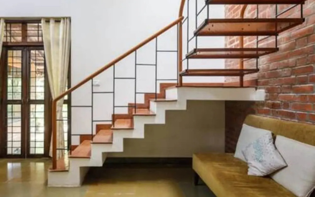 Kerala Style Villa by Stayjade | AC | 4bhk | fishpond