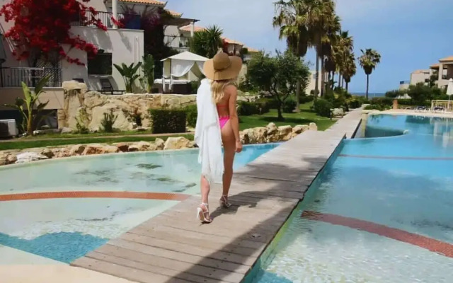 Cassiopeia 1BR Apt on Beach with Pool