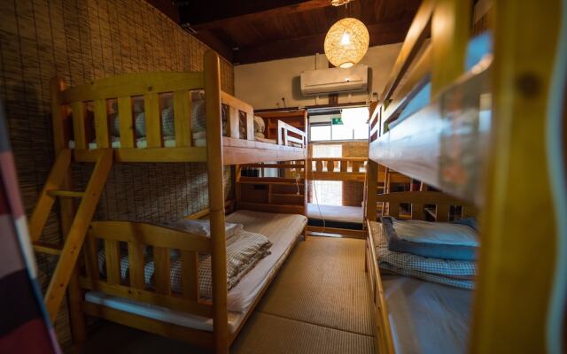 Guesthouse Momonga Village - Hostel