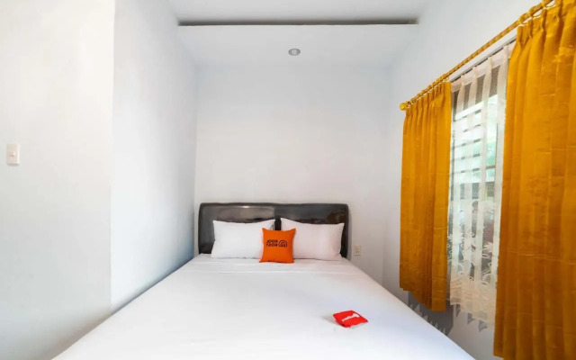 Kost M25 Hostel by Reddoorz