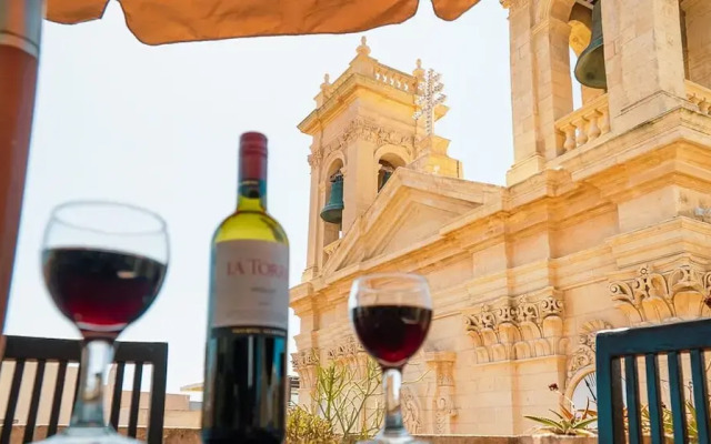 A Pretty Duplex Apartment in a Gozo Village Square