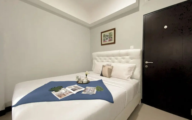 Minimalist And Cozy 1BR at Royal Heights Apartment