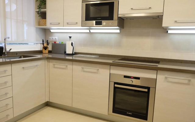 luxury modern apartment with terrace, pool and garage!