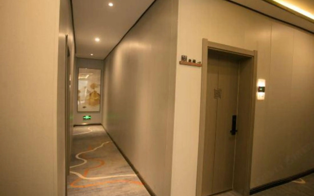 Home Inn Huaxuan Hotel Select (Zhoukou Taifuling Branch)