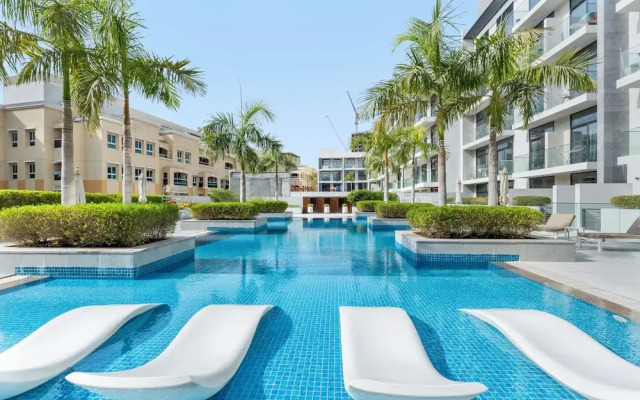 Waves - Stylish 1BR in JVC with Balcony & Pool