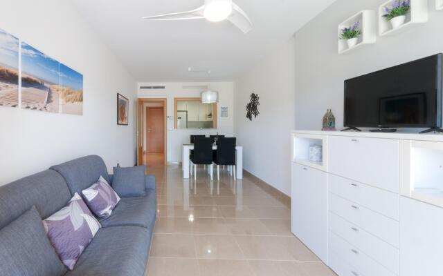AIRE - Apartment with shared pool in Oliva Nova. Free WiFi