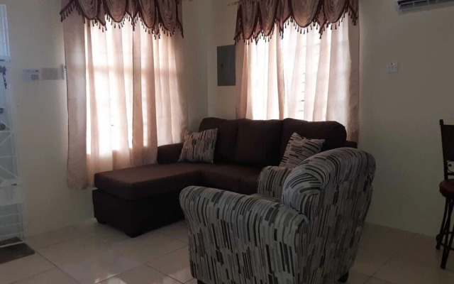 Charming 2-bed House in Portmore Gated Community