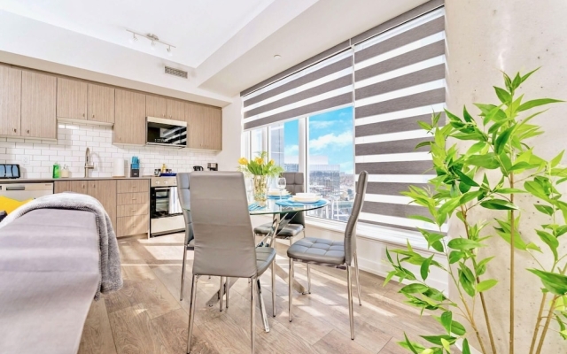 Deluxe 1BR Condo - City Views From Your Balcony
