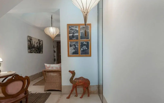 Riad Le J