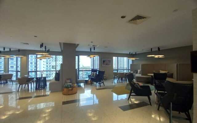 Capital O 950 Acqua Novotel Tower