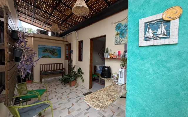 Quarto 100m da praia Pereque