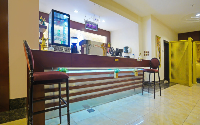 Capital O 596 Garden Palace Hotel