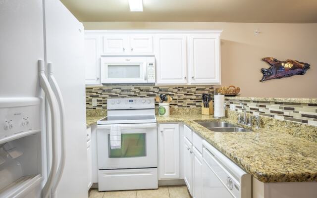 Waterwheel Treehouse Condo by RedAwning