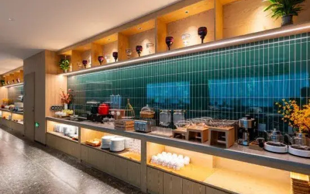 Qiuguo Hotel (Zibo Wanda Plaza Qishenghu Park Branch)